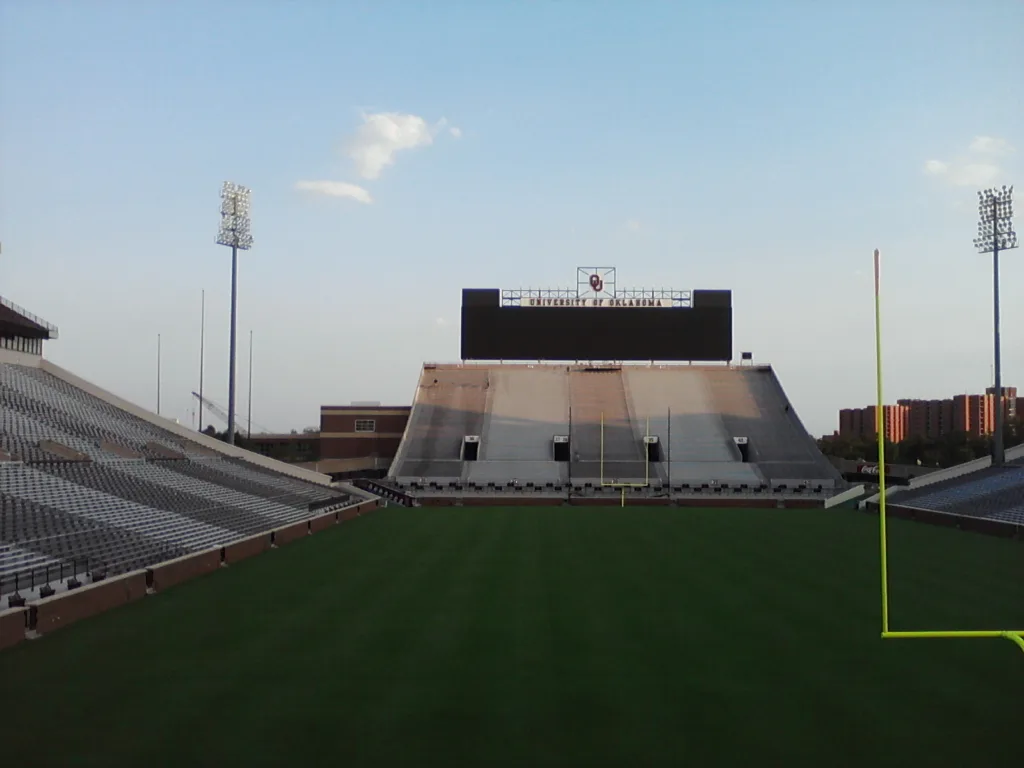 Commercial pressure washing service cleaning stadium bleachers and concrete seating - Full stadium seating view