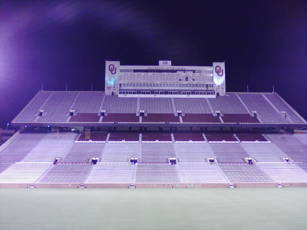 Commercial pressure washing service cleaning stadium bleachers and concrete seating in Norman Oklahoma - Full stadium seating view