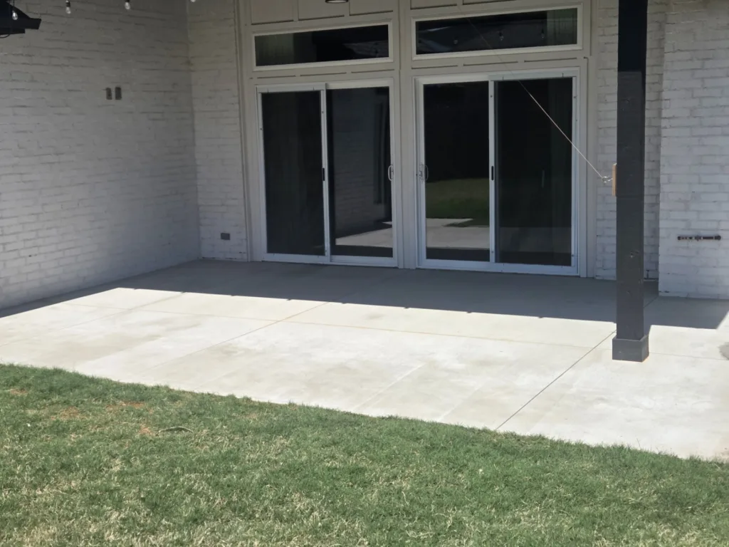 Back patio concrete surface cleaning and pressure washing service in Edmond Oklahoma